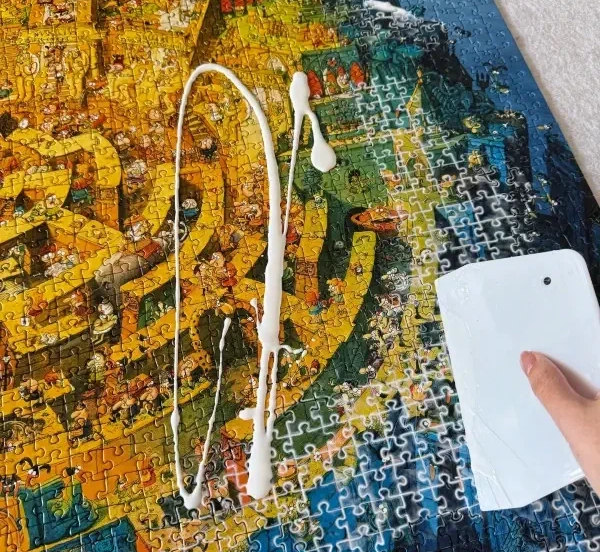 How to Glue a Puzzle: The Best Way to Seal and Preserve It 1 applying puzzle glue